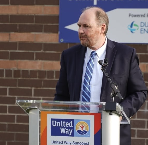 James Gillen delivering podium remarks at United Way Suncoast