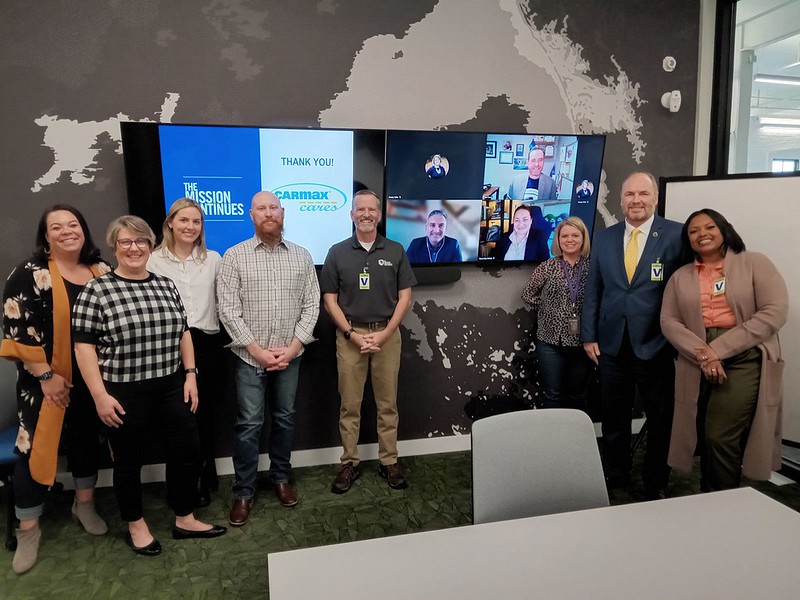 James Gillen at a CarMax headquarters meeting with donors and partners
